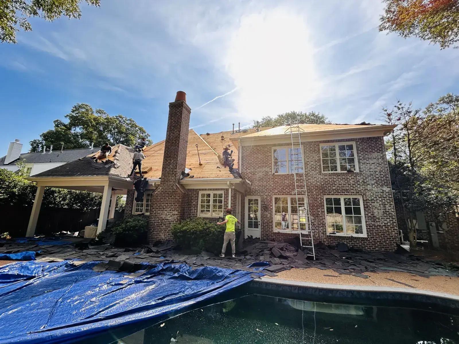 New synthetic underlayment and CertainTeed RoofRunner going down on fresh decking, detail of proper installation